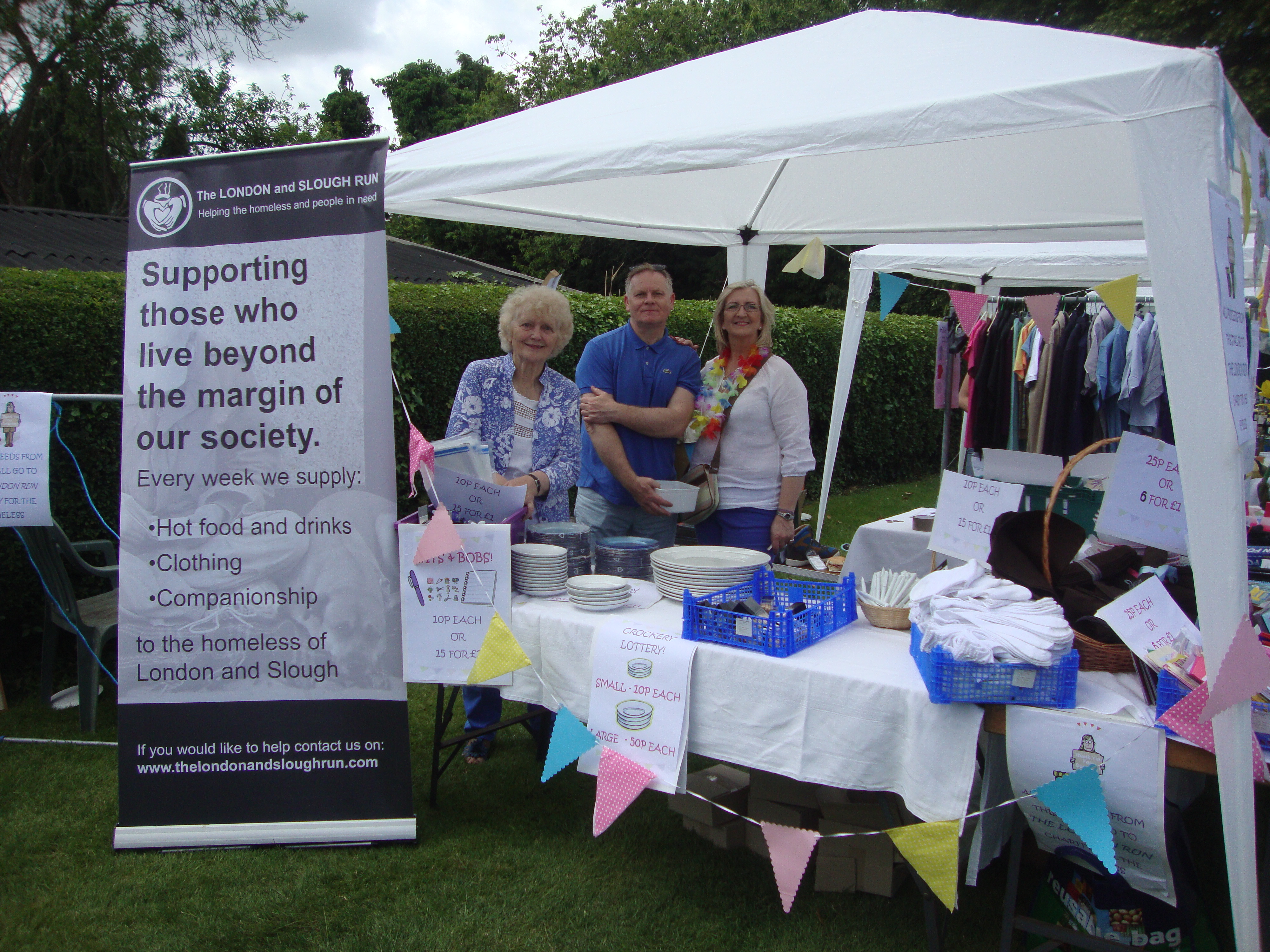 Volunteers manning a London and Slough Run stall at St Joseph’s fete in Gerrards Cross. Thank You!